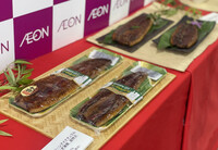 Aeon Retail's super-extralarge grilled eels on sale in Tokyo on June 23