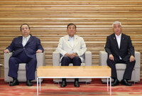 Japanese Prime Minister Shigeru Ishiba (center) and Defense Minister Gen Nakatani (right) at a cabinet meeting at the prime minister's office in Tokyo on Tuesday