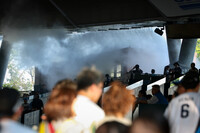 Mist sprayers cool off spectators at Belluna Dome, home of the Saitama Seibu Lions, in Tokorozawa, Saitama Prefecture, on July 8.