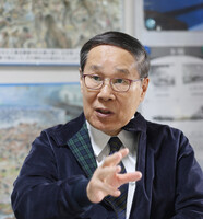 Japanese doctor Masao Tomonaga, who survived the 1945 U.S. atomic bombing of Nagasaki, southwestern Japan, pictured in Nagasaki in November 2024