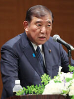 Japanese Prime Minister Shigeru Ishiba speaks at a press conference in Hiroshima on Wednesday.