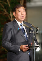 Japanese Prime Minister Shigeru Ishiba speaks to reporters at the prime minister's office in Tokyo on Thursday.