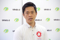 Nippon Ishin no Kai (Japan Innovation Party) leader Hirofumi Yoshimura speaks with reporters in the western Japan city of Osaka on Thursday after the opposition party decided to keep him in the post the same day.