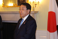Japanese economic revitalization minister Ryosei Akazawa speaks at a press conference in Washington on Thursday.