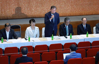 Prime Minister Shigeru Ishiba (center) speaks at the general meeting of the Liberal Democratic Party's lawmakers in Tokyo on Friday.