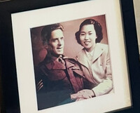Akiko Kirkham (right) and her husband, Glen, in a portrait from the early days of their marriage (Brisbane, Australia, July 26.)