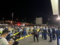 Entry restrictions are implemented in front of Osaka Metro's Yumeshima Station in Konohana Ward, Osaka, on Wednesday night.