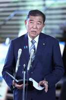 Japanese Prime Minister Shigeru Ishiba speaks to reporters at the prime minister's office in Tokyo on Tuesday.