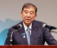 Japanese Prime Minister Shigeru Ishiba delivers a speech at a public-private business dialogue session at the Ninth Tokyo International Conference on African Development (TICAD 9) in Yokohama on Thursday.