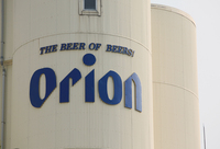The logo of Orion Breweries