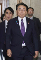 Japanese economic revitalization minister Ryosei Akazawa in parliament on Aug. 15